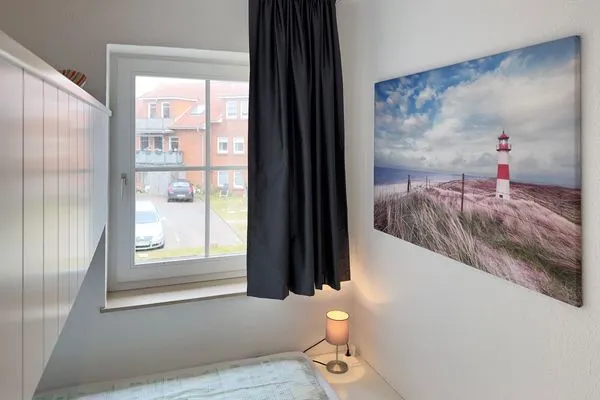 Schlafzimmer in der Ferienwohnung Südspitze 18/6 Meerblick in Wittdün auf Amrum Haus *Südspitze 18* Ferienwohnung Südspitze 18/6 - Meerblick