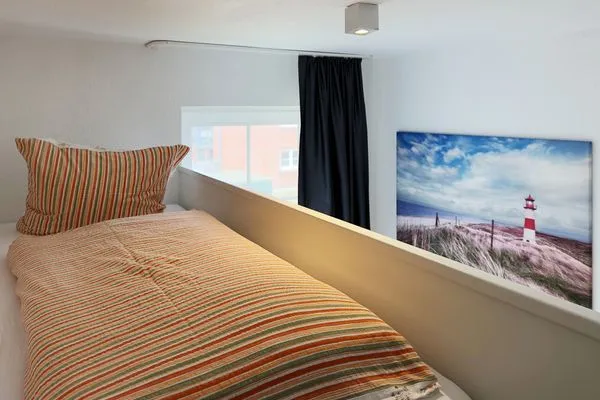 Hochbett im Schlafzimmer in der Ferienwohnung Südspitze 18/6 Meerblick in Wittdün auf Amrum Haus *Südspitze 18* Ferienwohnung Südspitze 18/6 - Meerblick