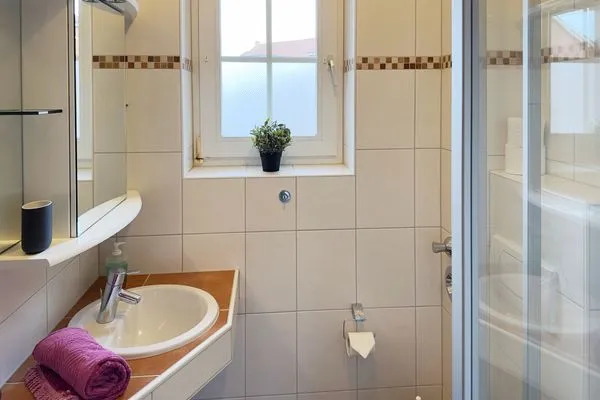 Badezimmer in der Ferienwohnung Südspitze 18/6 Meerblick in Wittdün auf Amrum Haus *Südspitze 18* Ferienwohnung Südspitze 18/6 - Meerblick