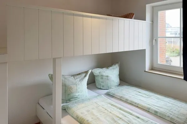 Schlafzimmer in der Ferienwohnung Südspitze 18/6 Meerblick in Wittdün auf Amrum Haus *Südspitze 18* Ferienwohnung Südspitze 18/6 - Meerblick