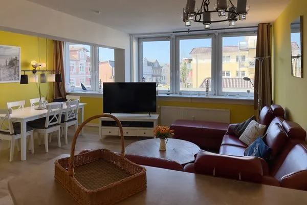 Wohnzimmer der Ferienwohnung "Willkommen bei den Hartmanns" in Wittdün auf Amrum Haus Nordenlicht Ferienwohnung „Willkommen bei den Hartmanns"