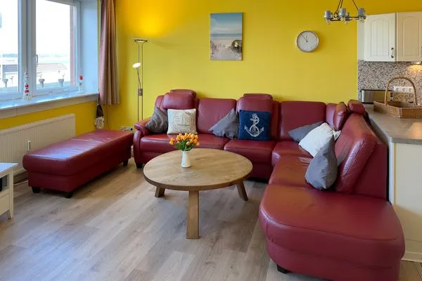 Wohnzimmer der Ferienwohnung "Willkommen bei den Hartmanns" in Wittdün auf Amrum Haus Nordenlicht Ferienwohnung „Willkommen bei den Hartmanns"