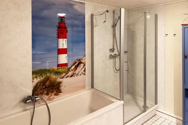Badezimmer der Ferienwohnung "Willkommen bei den Hartmanns" in Wittdün auf Amrum Haus Nordenlicht Ferienwohnung „Willkommen bei den Hartmanns"