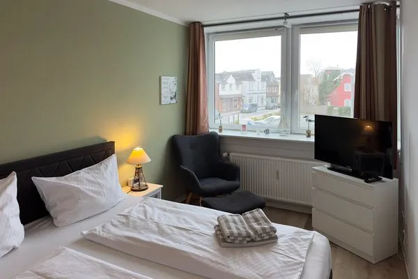 Schlafzimmer 2 der Ferienwohnung "Willkommen bei den Hartmanns" in Wittdün auf Amrum Haus Nordenlicht Ferienwohnung „Willkommen bei den Hartmanns"