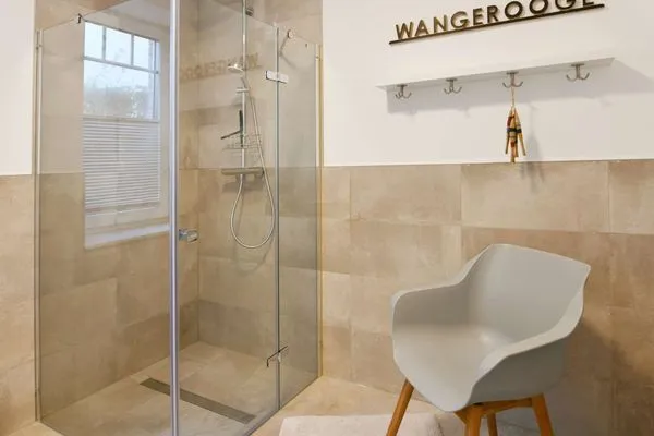 Badezimmer Haus im Dorfgroden 14 Ferienwohnung Muschelsucher