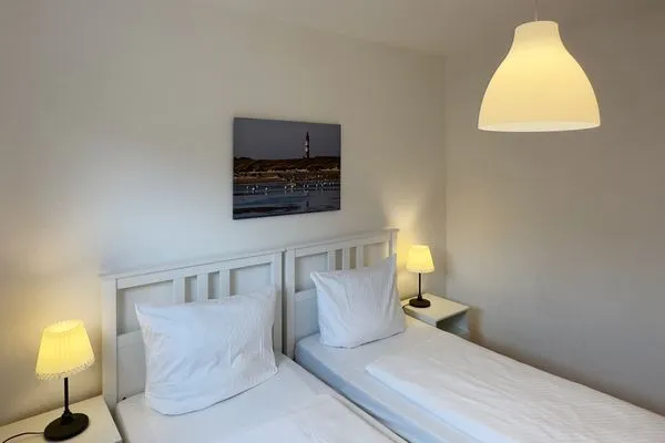 Schlafzimmer der Ferienwohnung Strandlöper in Wittdün auf Amrum Huus Heverknob Ferienwohnung *Strandlöper*