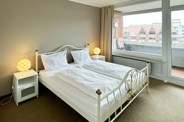 Schlafzimmer der Ferienwohnung Buchholtz in Wittdün auf Amrum Haus Nordenlicht Ferienwohnung „Dr. Buchholtz"