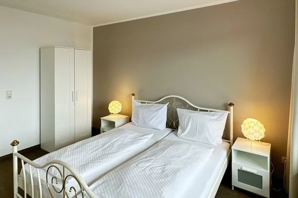 Schlafzimmer der Ferienwohnung Buchholtz in Wittdün auf Amrum Haus Nordenlicht Ferienwohnung „Dr. Buchholtz"