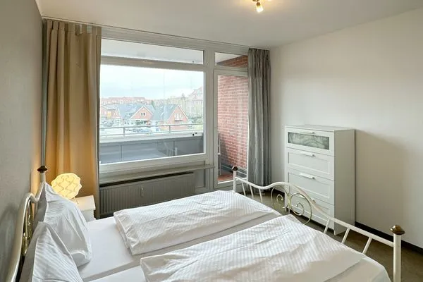 Schlafzimmer Haus Nordenlicht Ferienwohnung „Dr. Buchholtz"