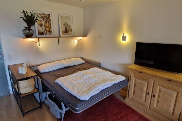  Ferienwohnung Bergblick Ferienwohnungen in Weissensee - Wohnzimmer