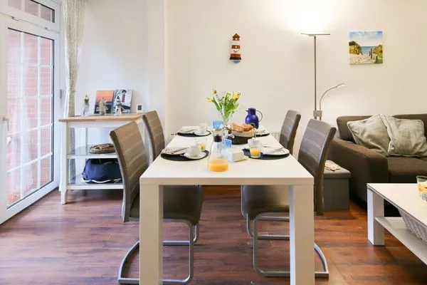 Wohnzimmer Familienhaus im Dorfgroden 27 Ferienwohnung Zugvogel