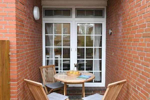 Terrasse Familienhaus im Dorfgroden 27 Ferienwohnung Zugvogel