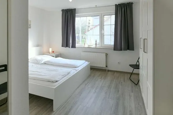 Schlafzimmer Familienhaus im Dorfgroden 27 Ferienwohnung Zugvogel