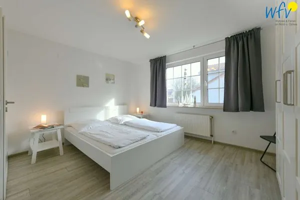 Schlafzimmer Familienhaus im Dorfgroden 27 Ferienwohnung Zugvogel