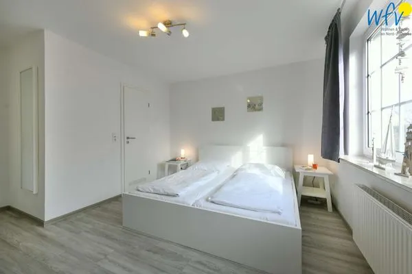 Schlafzimmer Familienhaus im Dorfgroden 27 Ferienwohnung Zugvogel