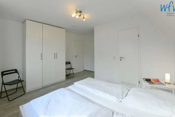 Schlafzimmer Familienhaus im Dorfgroden 27 Ferienwohnung Zugvogel