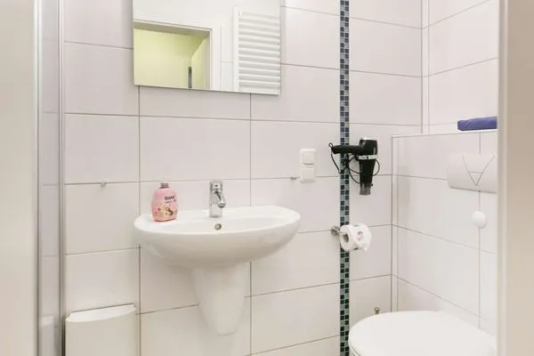 Badezimmer Familienhaus im Dorfgroden 27 Ferienwohnung Zugvogel