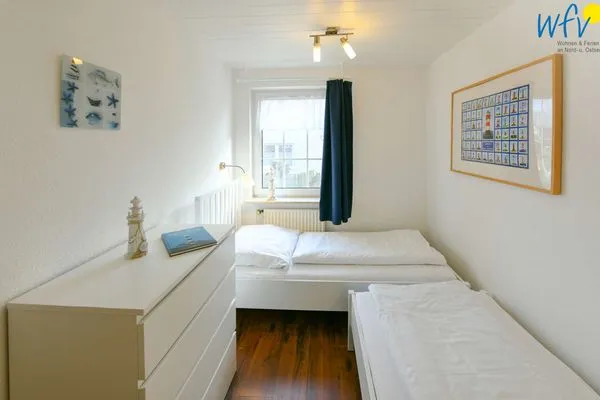 Schlafzimmer Familienhaus im Dorfgroden 27 Ferienwohnung Zugvogel