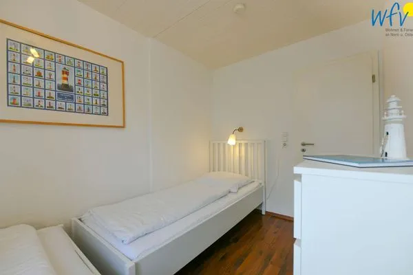 Schlafzimmer Familienhaus im Dorfgroden 27 Ferienwohnung Zugvogel
