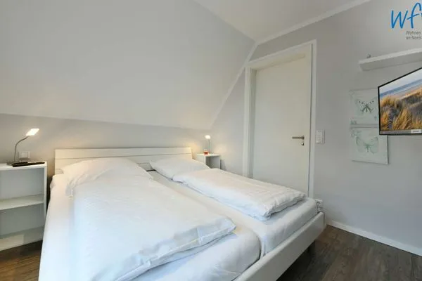 Schlafzimmer Bootshaus in den Dünen - 4 Ferienwohnung Sonnendeck