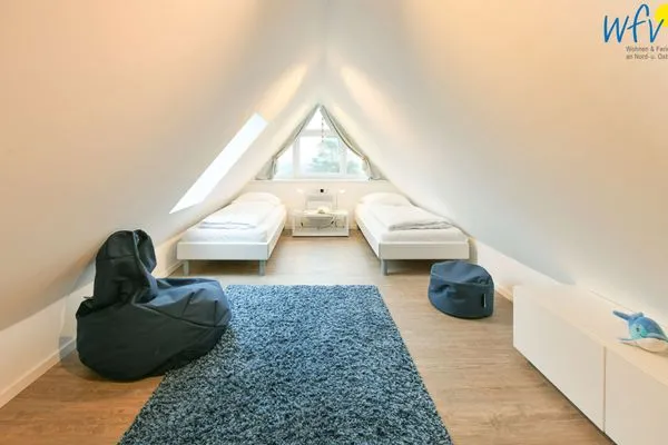 Schlafzimmer Bootshaus in den Dünen - 4 Ferienwohnung Sonnendeck