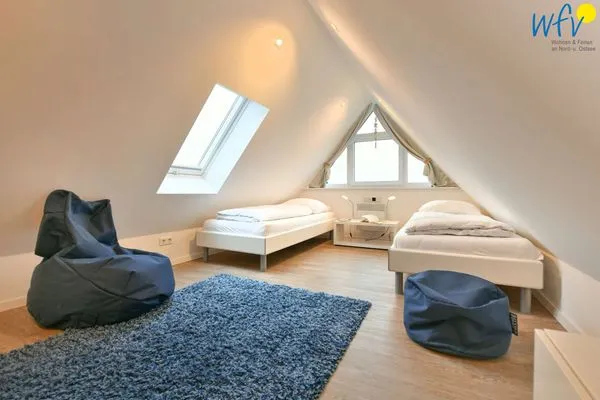 Schlafzimmer Bootshaus in den Dünen - 4 Ferienwohnung Sonnendeck