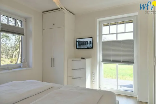 Schlafzimmer Bootshaus in den Dünen - 5 Ferienwohnung Dünengeflüster