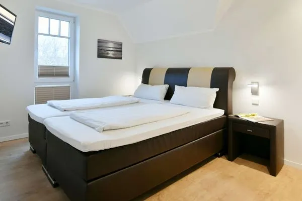 Schlafzimmer Bootshaus in den Dünen - 5 Ferienwohnung Strandgut