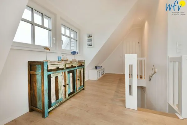 Wohnzimmer Bootshaus in den Dünen - 5 Ferienwohnung Strandgut