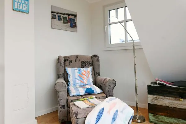 Wohnzimmer Bootshaus in den Dünen - 5 Ferienwohnung Strandgut