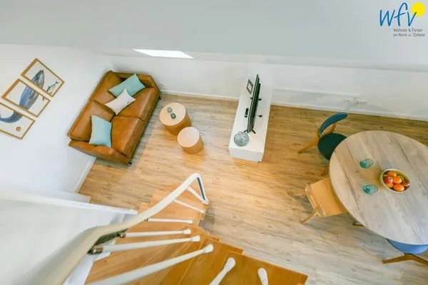 Wohnzimmer Haus am Dorfbrunnen Ferienwohnung Meer