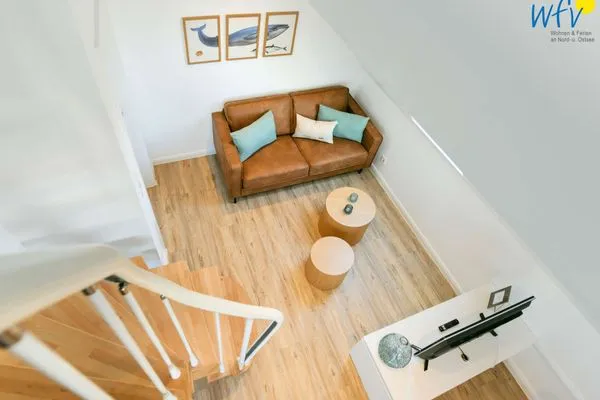 Wohnzimmer Haus am Dorfbrunnen Ferienwohnung Meer