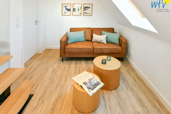 Wohnzimmer Haus am Dorfbrunnen Ferienwohnung Meer