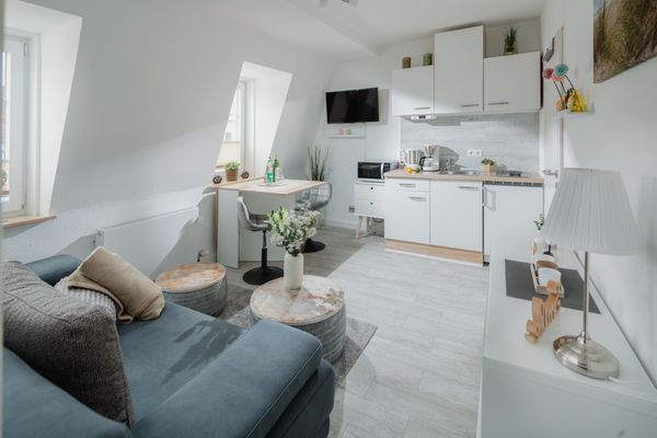  Haus Bielefeld Ferienwohnung 33a  - Wohnzimmer