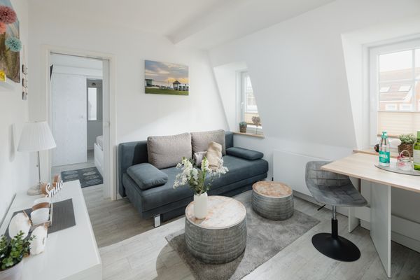  Haus Bielefeld Ferienwohnung 33a  - Wohnzimmer