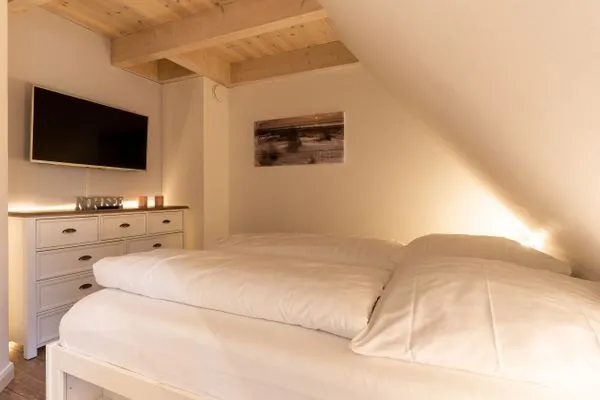 Reetdachhaus Dünenstieg Reetdachhaus Dünenstieg sechs SPO Dorf - 