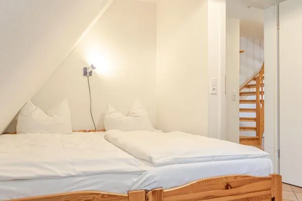 Schlafzimmer mit zwei Einzelbetten Achtern Diek Achtern Diek 8a - Wohnung 5
