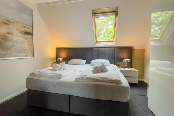 Leuchtfeuer Voßhörn Whg. 4 Duhnen - Schlafzimmer