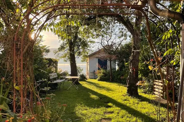  Ferienwohnung Idylle am See Lindau Insel - Blick auf Garten und See