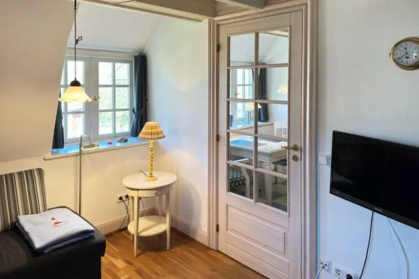 Wohnzimmer in der Ferienwohnung Hafis 9 in Nebel auf Amrum  Friesenhof, Hs. Hafis, Whg. 9