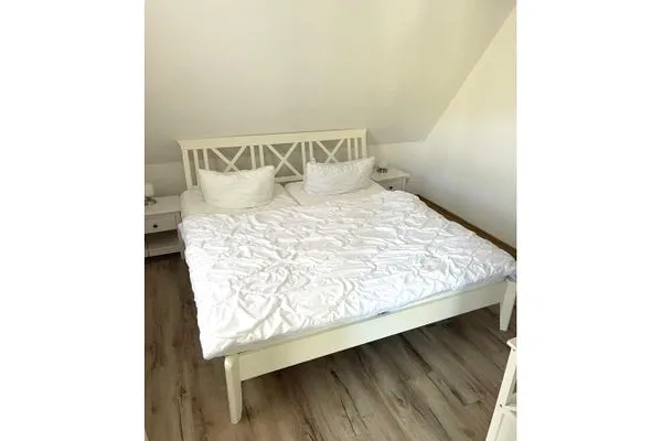 Schlafzimmer mit Doppelbett  Wohnung Manu