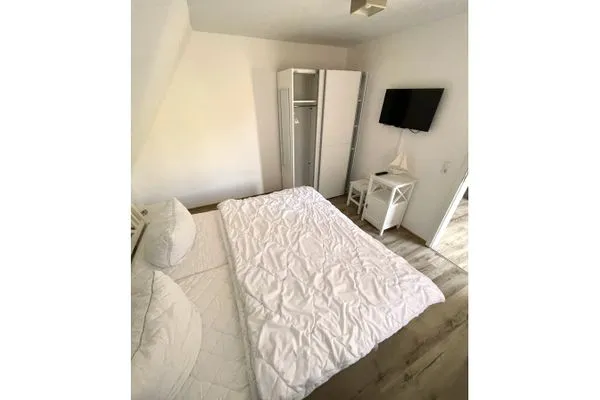 Schlafzimmer mit Doppelbett  Wohnung Manu