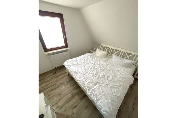Schlafzimmer mit Doppelbett  Wohnung Manu