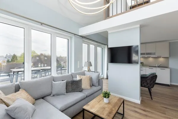 Wohnzimmer Sturmfrei Ferienwohnung "Galerie 1"