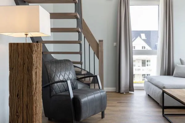 Wohnzimmer Sturmfrei Ferienwohnung "Galerie 1"