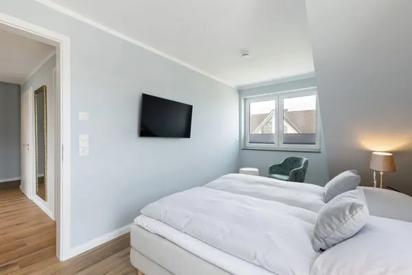 Schlafzimmer Sturmfrei Ferienwohnung "Galerie 1"
