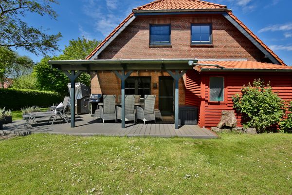  Ferienhaus 8er Huus Wangarou Wangerooge - Gartenblick