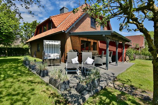  Ferienhaus 8er Huus Wangarou Wangerooge - Gartenblick
