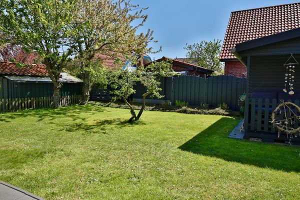  Ferienhaus 8er Huus Wangarou Wangerooge - Gartenblick