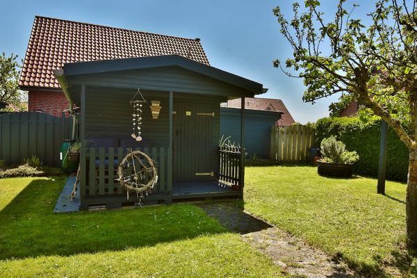  Ferienhaus 8er Huus Wangarou Wangerooge - Gartenblick